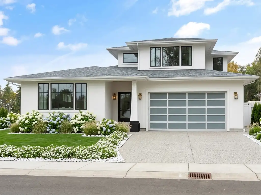 Plan 280263JWD Northwest Modern with stacked low-pitch hip roofs, black windows and a glass garage door