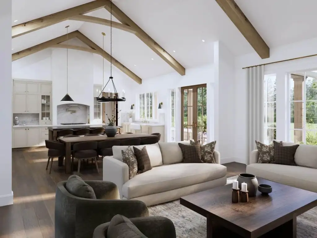 Plan 270128AF vaulted great room with exposed timber trusses, plaster fireplace, French doors to the rear patio, open to the kitchen and dining