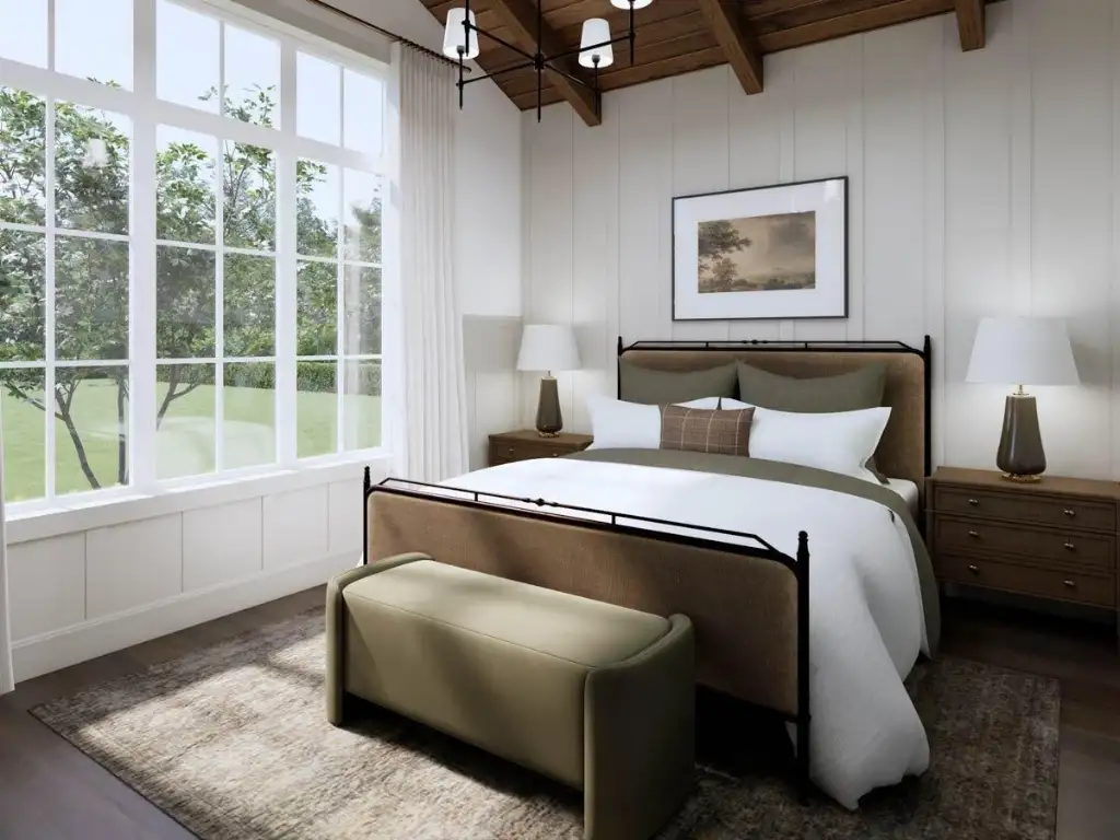 Vaulted primary bedroom with exposed wood beams, large windows to the yard and an upholstered bed