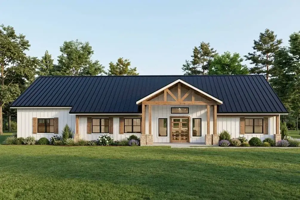 Detail of the gable front porch with exposed timber trusses, board-and-batten siding, dark window shutters, and stone veneer column bases
