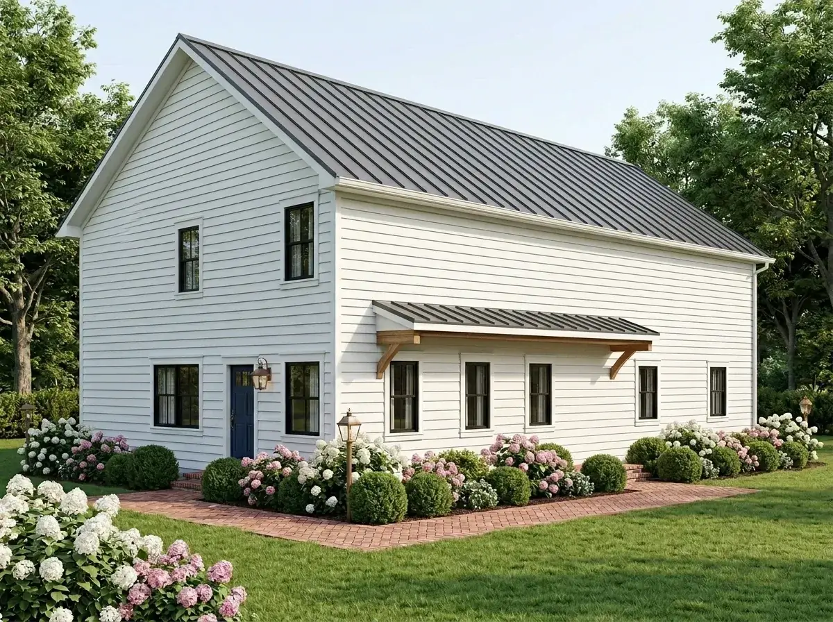 Traditional white farmhouse facade with white horizontal lap siding, dark grey metal roof, black windows, and dark blue front door