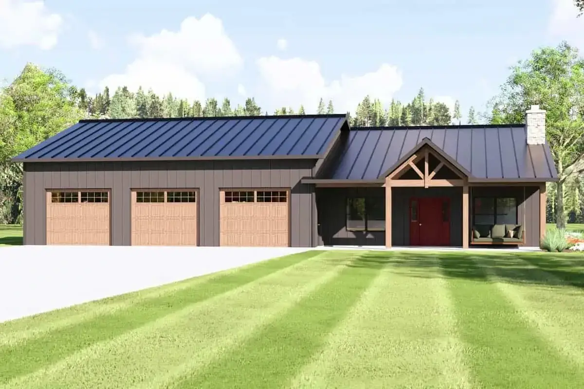 Plan 135423GRA angled exterior view — long single-story barndominium silhouette with dark metal roof and natural wood porch posts