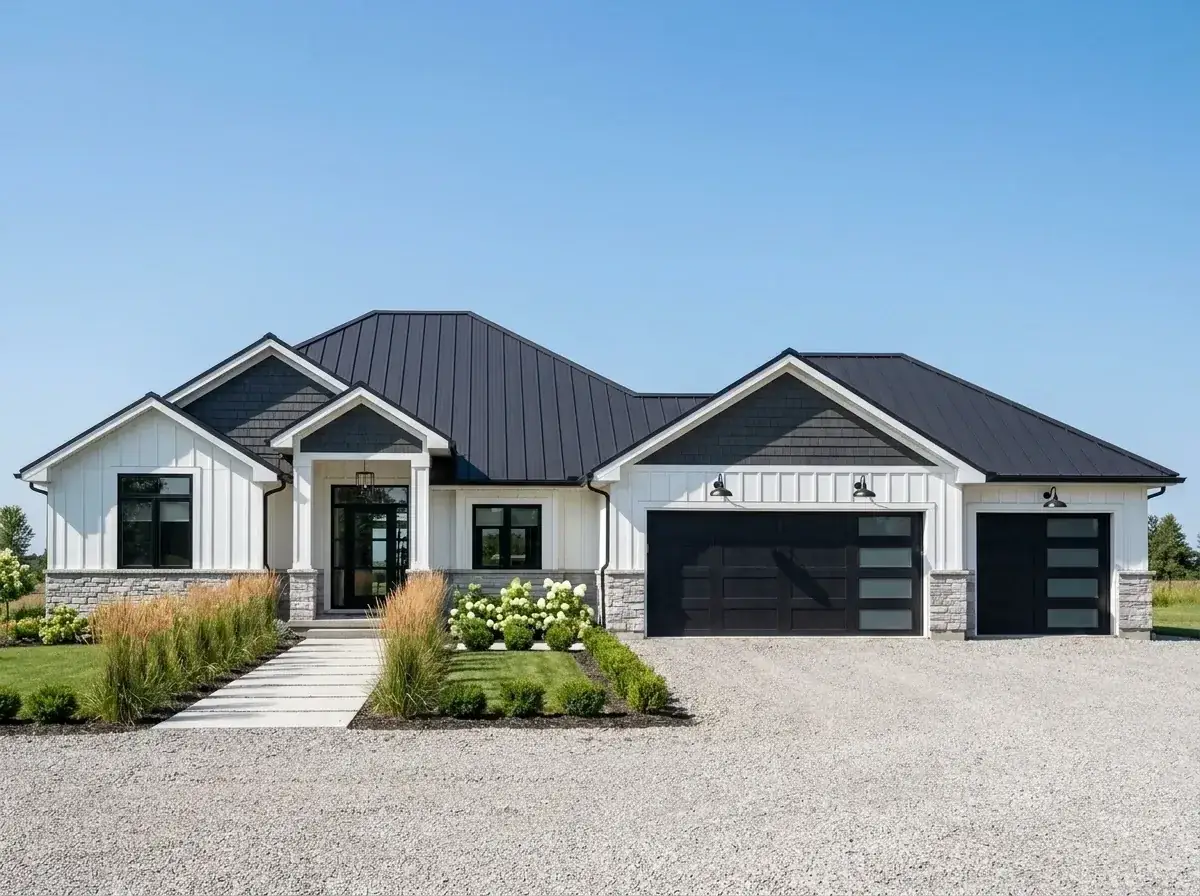 Modern farmhouse facade variation — white board-and-batten siding, black metal roof, stone base