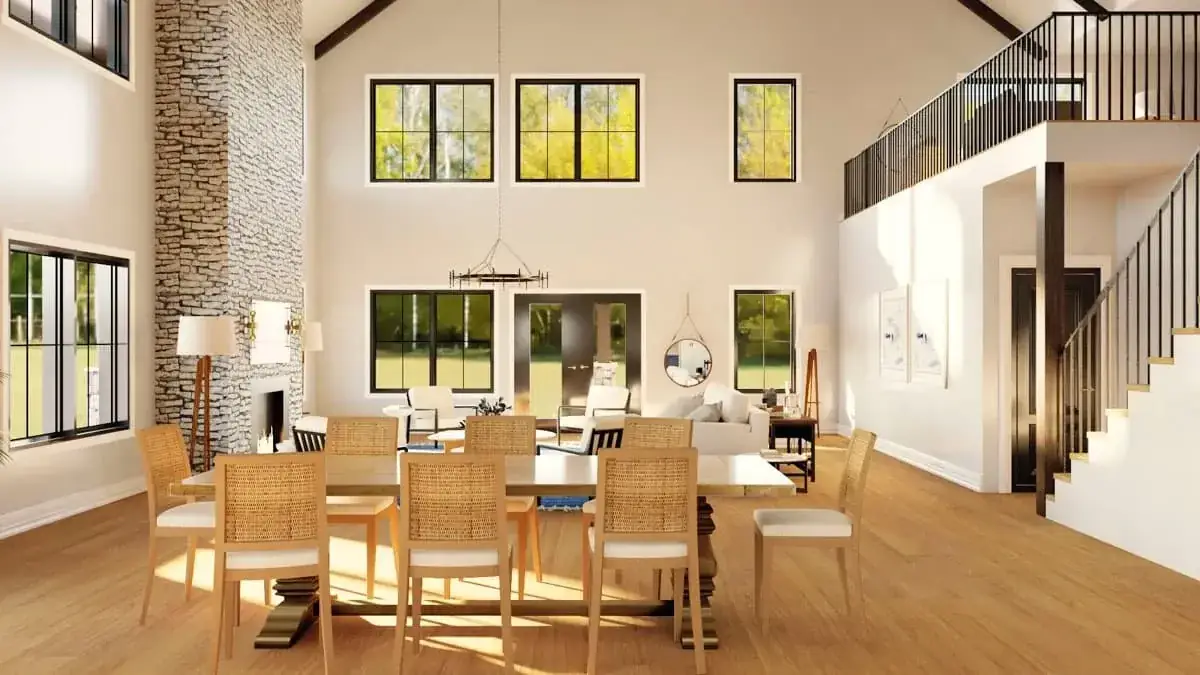 Dining area with large windows and view to the two-story great room