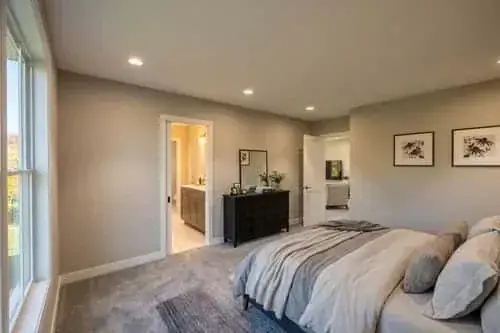 View from kitchen toward rear windows and patio access