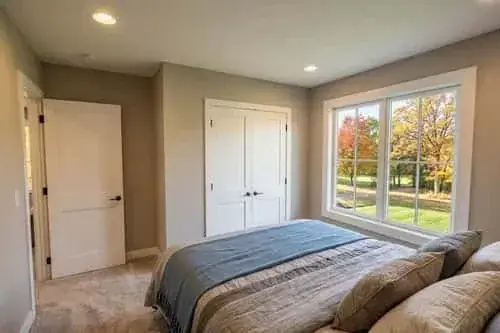 Primary bathroom with dual vanity and walk-in shower
